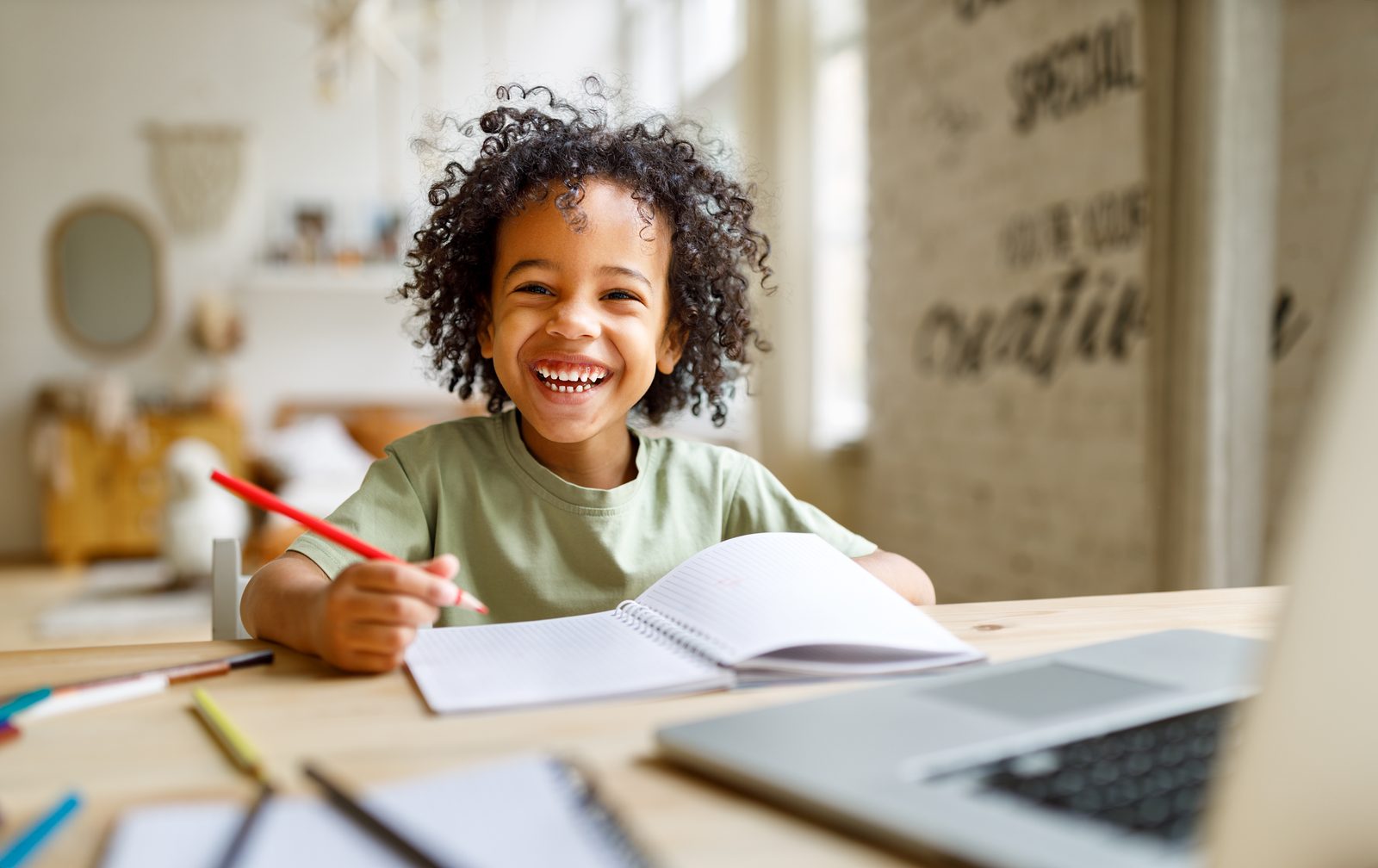 A happy student, confident and smiling after a tutoring session